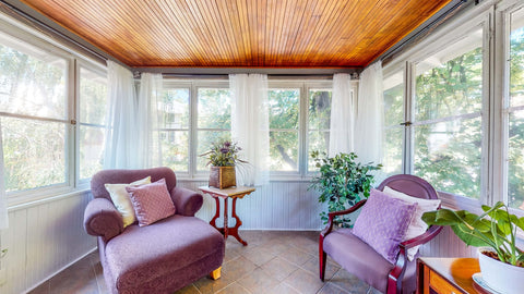 The Governor's Suite — private sunroom and clawfoot tub